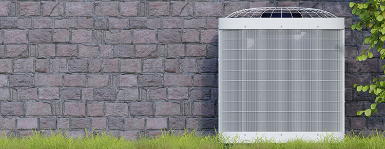 An outdoor AC unit with clear space around it